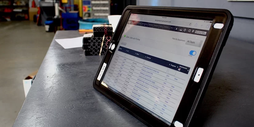 quality-mgmt-system A tablet displaying a quality management system within an electric motor service company.