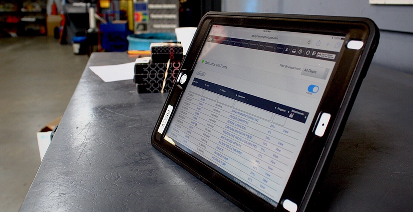 quality-mgmt-system A tablet displaying a quality management system within an electric motor service company.