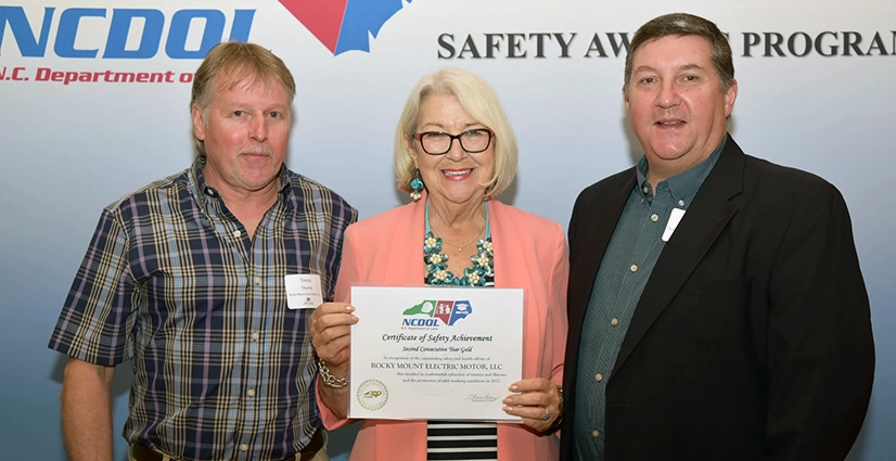 safety-award2 Rocky Mount Electric Motor accepting their certificate of safety achievement from NCDOL.