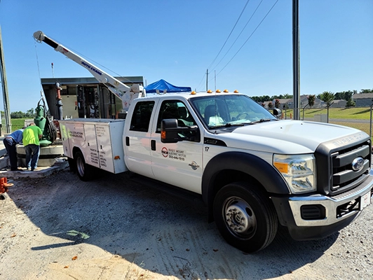 A service truck from Rocky Mount Electric Motor performing on-site maintenance for electric motors.