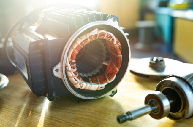 Close-up of iron industrial motor lies on a table Close-up of an iron industrial motor that lies on a table ready for predictive maintenance work.